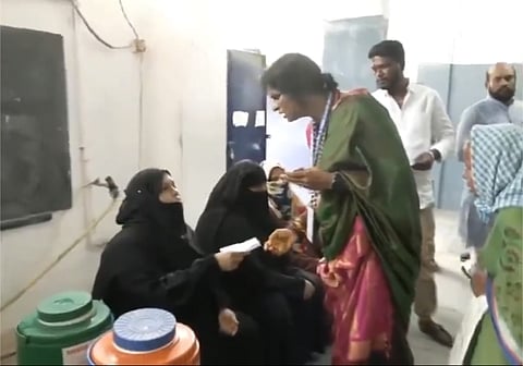 BJP's Hyderabad MP candidate, Madhavi intimidates Muslim women voters  to remove veil at polling booth 