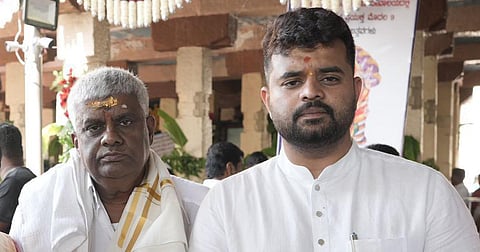 Former Karnataka minister and Janata Dal (Secular) leader HD Revanna (left) with his son and Hassan MP Prajwal Revanna.