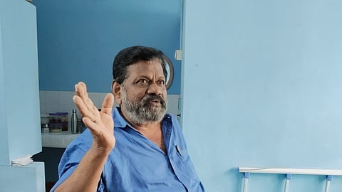 Ravindran Nair in his hospital room