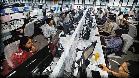 Illustration of a busy office with numerous people working at computer desks, arranged in two rows in a large, brightly lit room.