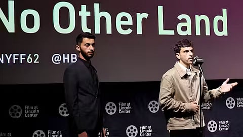 Directors Basel Adra, left, and Yuval Abraham on stage at the 62nd New York Film Festival on Sept. 29, 2024. 