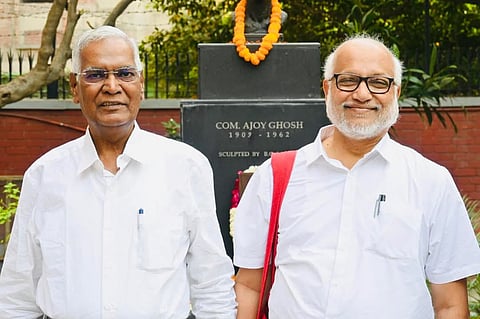 Image featuring communist leaders D Raja and MA Baby wearing white shirts. 