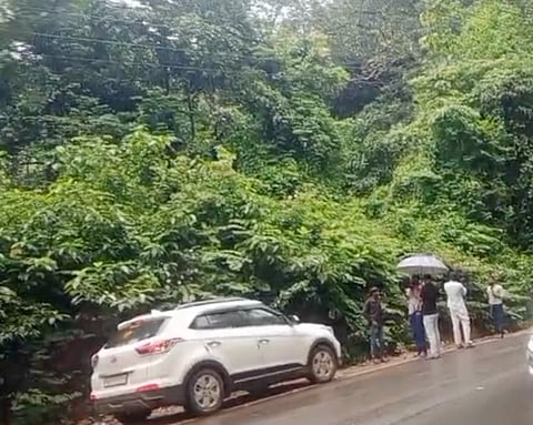 The witness who alleged that he buried several bodies in Dharmasthala waited by the road in the temple town. 