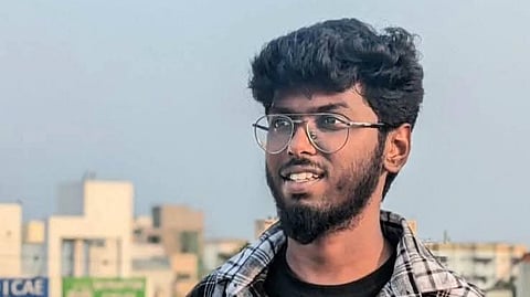 Kavin in a black and white chequered shirt 