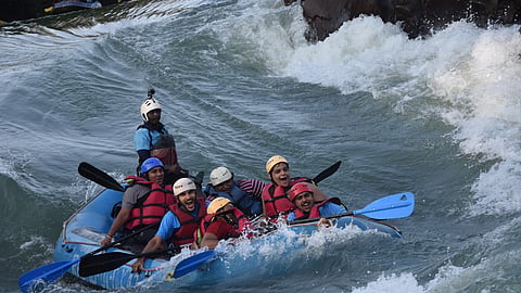 A group of people enjoying whitewater rafting in Dandeli, Karnataka