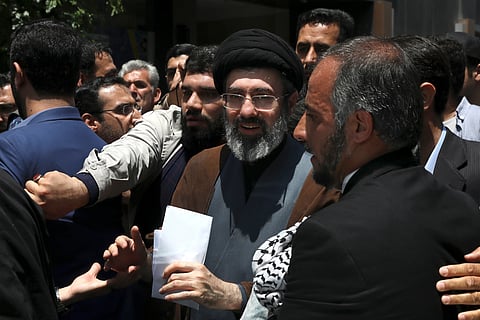 Mojtaba Khamenei, the son of Iranian Supreme Leader Ayatollah Ali Khamenei, center, attends the annual Quds, or Jerusalem Day rally in Tehran, Iran, on May 31, 2019. 