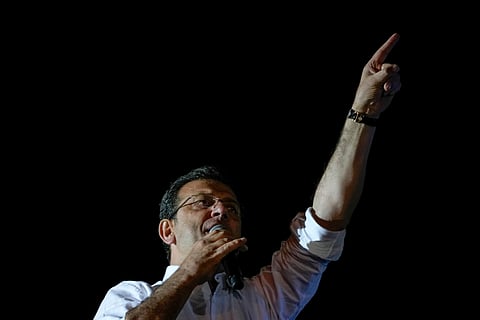 Istanbul Mayor and Republican People's Party, or CHP, candidate Ekrem Imamoglu addresses supporters outside the City Hall in Istanbul, Turkey, early Monday, April 1, 2024. 