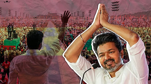 A man in a white shirt – actor Vijay – smiles and raises his hands in a greeting gesture in the foreground, with a large crowd and a red-and-yellow flag featuring a symbol in the background. Another view shows him from behind addressing the crowd at a rally.
