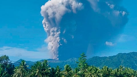 In this photo released by the Badan Geologi, the geological agency of Indonesia's Ministry of Energy and Mineral Resources, Mount Dukono releases volcanic materials during an eruption in North Halmahera, Indonesia, Friday, May 8, 2026. 