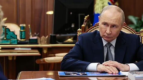 The Russian president, Vladimir Putin, attends a meeting at the Kremlin in Moscow, Russia, on May 12. 