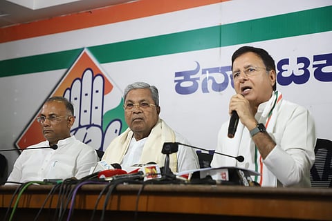 Karnataka Chief Minister Siddaramaiah, Randeep Singh Surjewala and Dinesh Gundu Rao