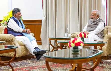 Karnataka Chief Minister D.K. Shivakumar and Prime Minister Narendra Modi