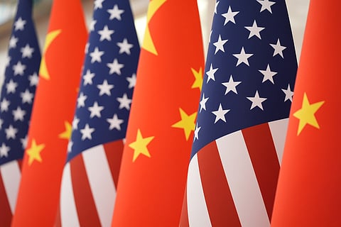 The U.S. and Chinese flag at the Great Hall of the People prior to the state dinner of President Donald Trump and Chinese President Xi Jinping on May 14, 2026, in Beijing. 