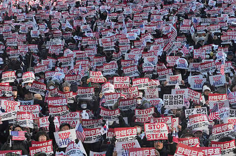 Supporters of impeached South Korean President Yoon Suk Yeol attend a rally to oppose his impeachment near the presidential residence in Seoul, South Korea, Jan. 6, 2025. 