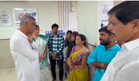 Former minister Harish Rao with family members of the Banswada C-Section victims.