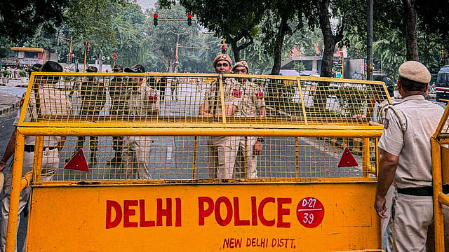 Delhi police personnel at the barricades