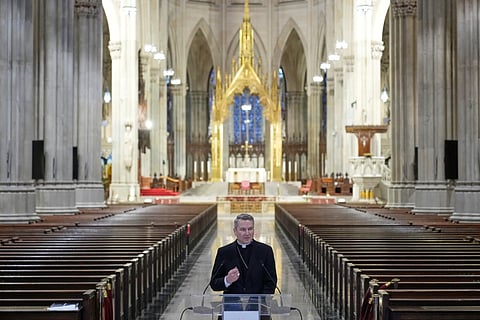 Archbishop-designate Ronald Hicks talks to reporters during a news conference at St. Patrick's Cathedral in New York.