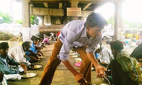 Meals under a bridge: The story of a man who feeds the poor with his own money