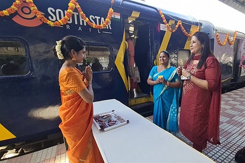 Passengers being welcomed before they board India's first train