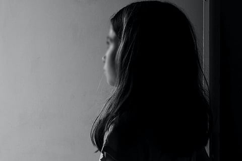 Girl standing alone