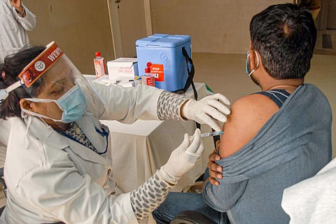 A person being vaccinated 