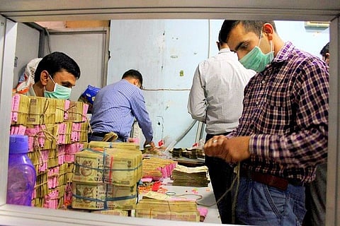 Is the cash crunch behind Andhra and Telangana topping e-transactions in India?
