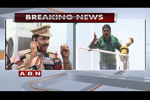 Debt-hit Telangana farmer perches atop phone tower near assembly