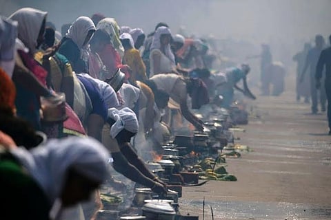 Images: Women offer Attukal Pongala to propitiate the Goddess at the Bhagavathy Temple