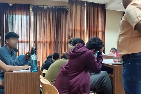 Lecturer talking to student