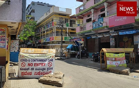 A barricade put on a street in Bengaluru to demarcate a containment zone