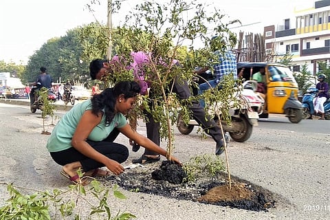 Tired of bad roads, residents in Hyderabad 'plant trees' in potholes