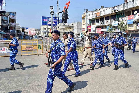 Rapid Action Force personnel conduct a route march as security was beefed up after the murder of Bajrang Dal leader Harsha in Shivamogga