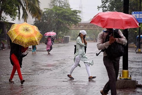 People walking with umbrella in rain