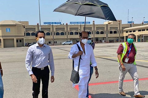 Rajinikanth is seen wearing a white kurta and is seen walking.