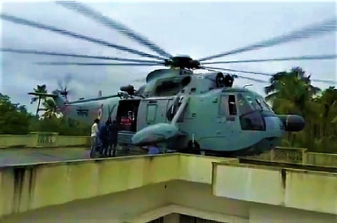 Kerala floods: Navy chopper lands on narrow rooftop in daring rescue of 26 people
