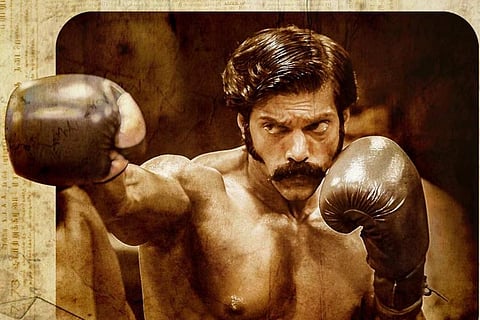 Arya is seen as a boxer in a poster from Sarpatta Parambarai.