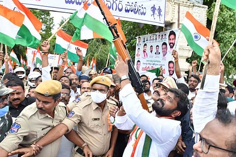 Screengrab of Srinivas Goud firing a gun at an Independence Day celebration in Mahbubnagar