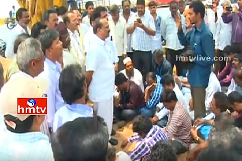Kesineni woes: Angry workers demand salary, stage protest at Vijayawada office