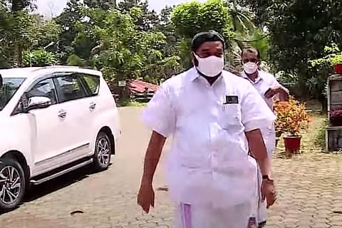 Kerala CPI(M) Minister VN Vasavan in a full white attire arriving at Pala Bishop House 