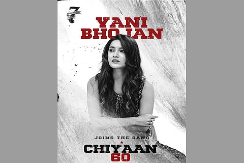 Vani Bhojan is seen in the poster released by the makers of 'Chiyaan60' to welcome her to the cast. 