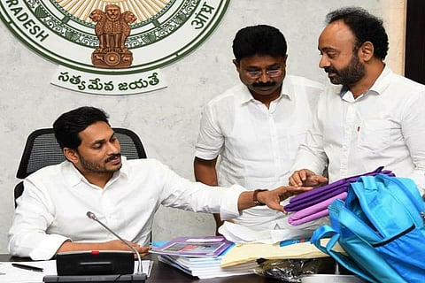 YS Jagan Mohan Reddy accompanied by Educatyion Minister Adimulapu Suresh 