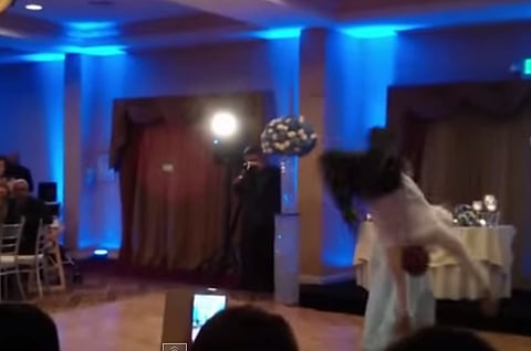 Video: Groom knocks out bride as he performs a backflip during first dance