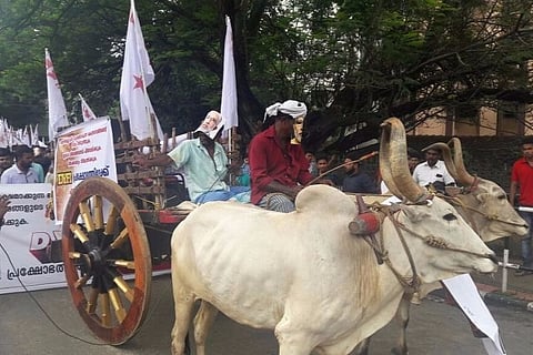 DYFI protests against petrol hike, marches with bullock carts to central govt offices in Kerala