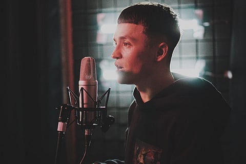 Man singing before a mic
