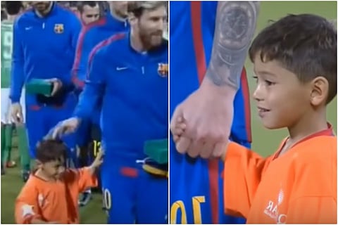 Watch: Six-year-old Afghan boy meets Messi and just wouldn't let go of him