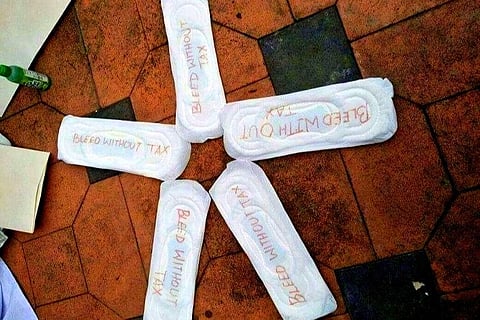 Bleed without tax: SFI sends sanitary napkins to Arun Jaitley 