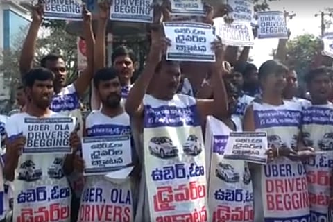 Striking Hyderabad cab drivers turn 'beggars' to protest against Ola and Uber 