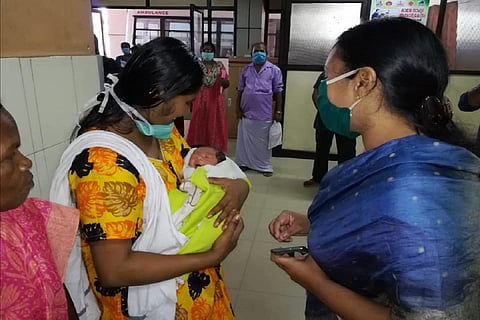 Rincy and newborn with Veena George