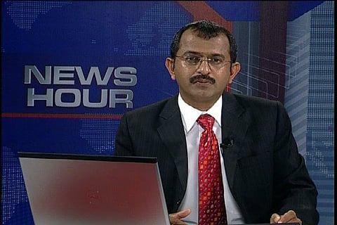 Why has Kerala CM Chandy named Asianet anchor Vinu John in his defamation suit?