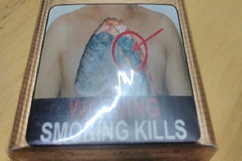 ITC arm-twisting? Closes cigarette factories, not ready to print larger pictorial warnings